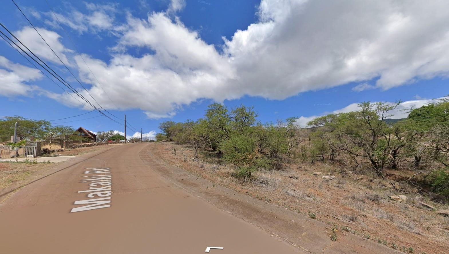 Makaiki Road, Unit 256 Kaunakakai, HI 96748 - Photo 5 of 7 a view of a city street with a building