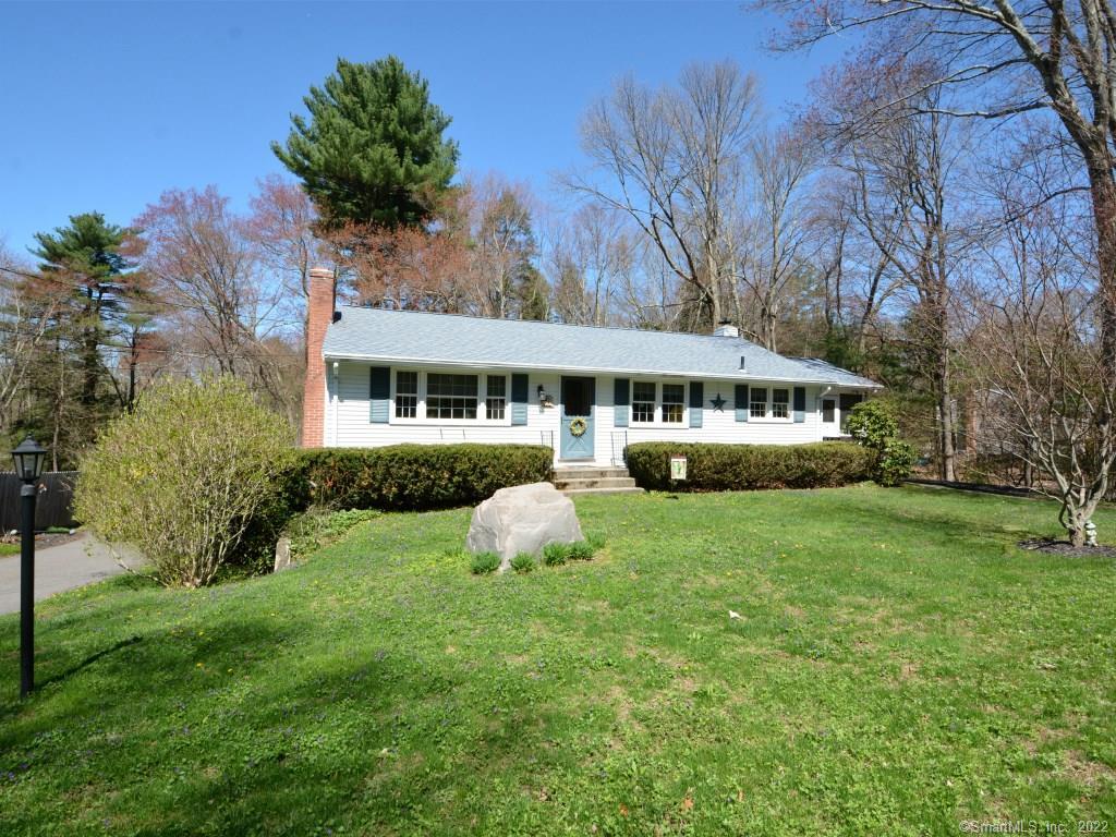 133 Conklin Road Stafford, CT 06076 - Photo 1 of 1 a front view of a house with a yard and trees