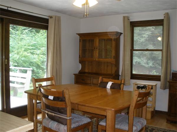 15 Old Stage Road Hatfield, MA 01088 - Photo 12 of 16 a view of a dining room with furniture window and outside view