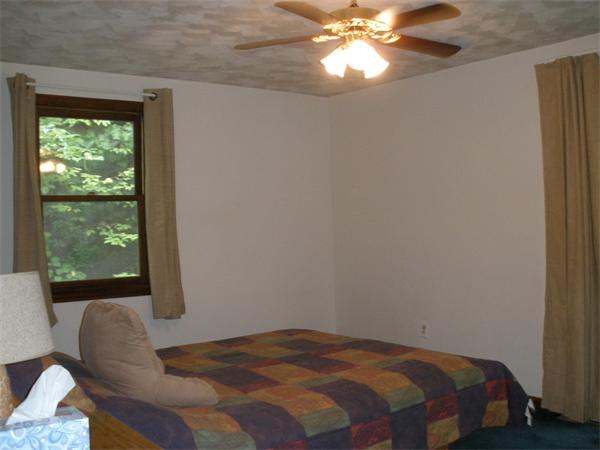 15 Old Stage Road Hatfield, MA 01088 - Photo 14 of 16 a bedroom with a bed and a window