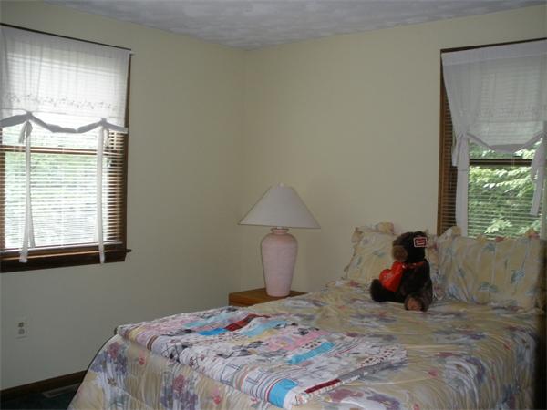 15 Old Stage Road Hatfield, MA 01088 - Photo 15 of 16 a bedroom with a bed and a window