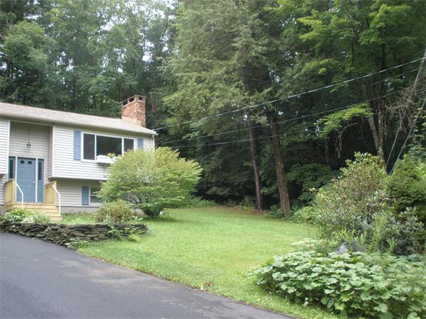 15 Old Stage Road Hatfield, MA 01088 - Photo 4 of 16 a view of a house with a yard and potted plants