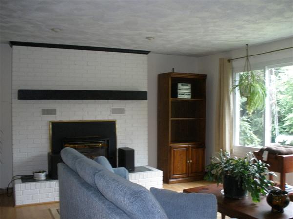 15 Old Stage Road Hatfield, MA 01088 - Photo 6 of 16 a living room with furniture a window and a fireplace