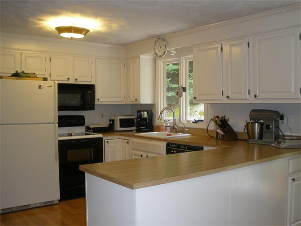 15 Old Stage Road Hatfield, MA 01088 - Photo 10 of 16 a kitchen that has a lot of cabinets a sink and appliances in it