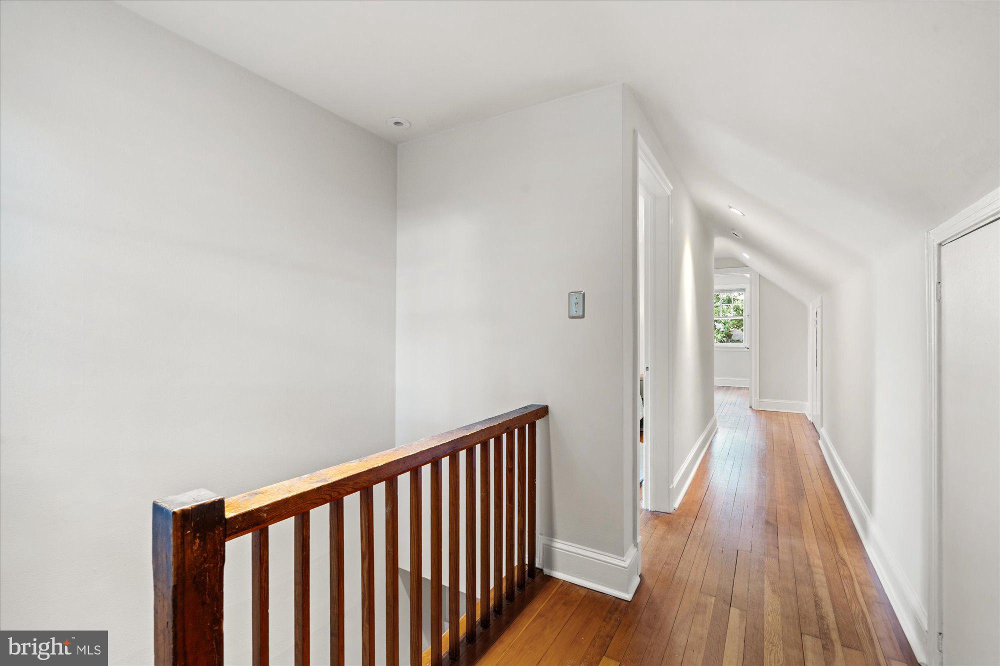 823 Bonifant Street Silver Spring, MD 20910 - Photo 24 of 42 Upper level hallway with lots of eaves storage