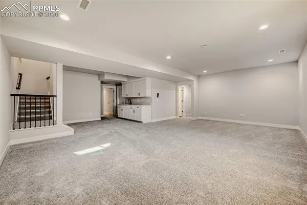 a view of empty room with natural light