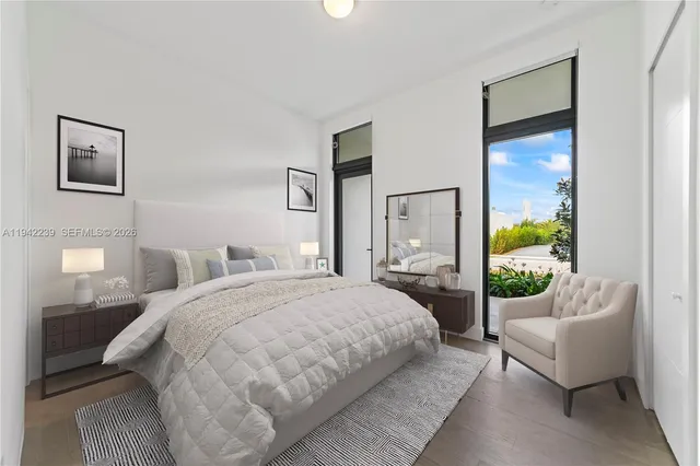 a view of a house with backyard and a garden