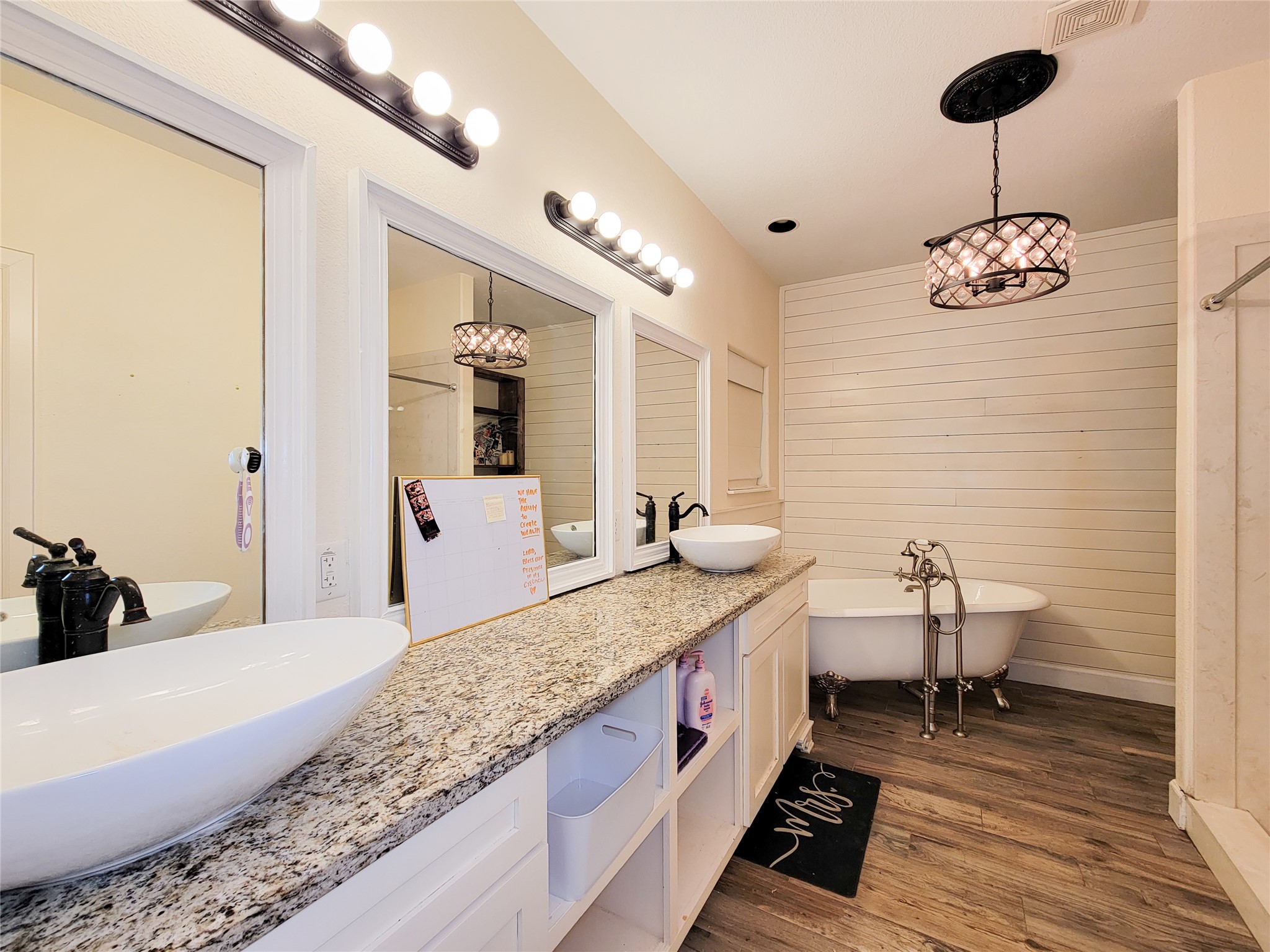 2011 Old Ox Road Spring, TX 77386 - Photo 3 of 38 a spacious bathroom with a granite countertop sink and a mirror