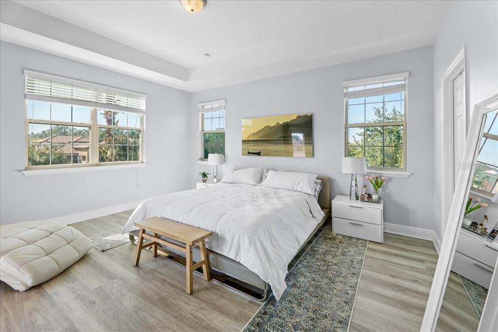 8746 Crescendo Avenue Windermere, FL 34786 - Photo 19 of 56 a bed room with a bed and a couch