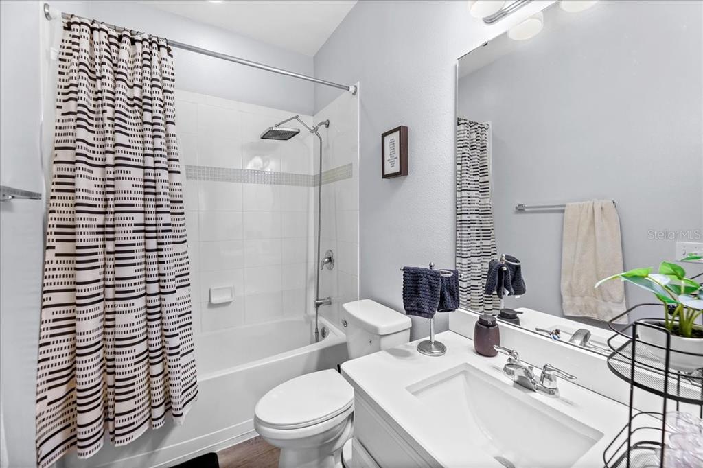 8746 Crescendo Avenue Windermere, FL 34786 - Photo 26 of 56 a bathroom with a sink toilet and shower