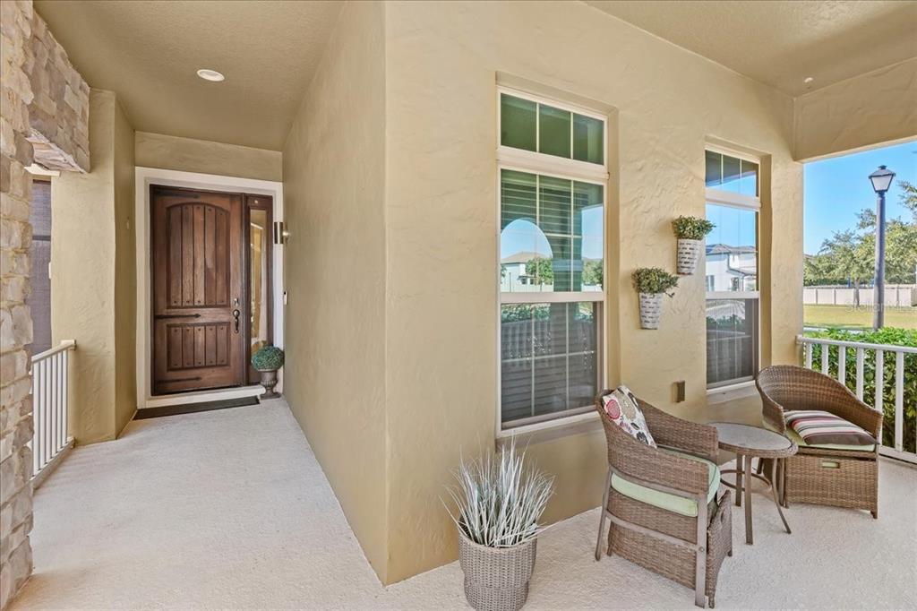 8746 Crescendo Avenue Windermere, FL 34786 - Photo 3 of 56 a dining room with furniture and window