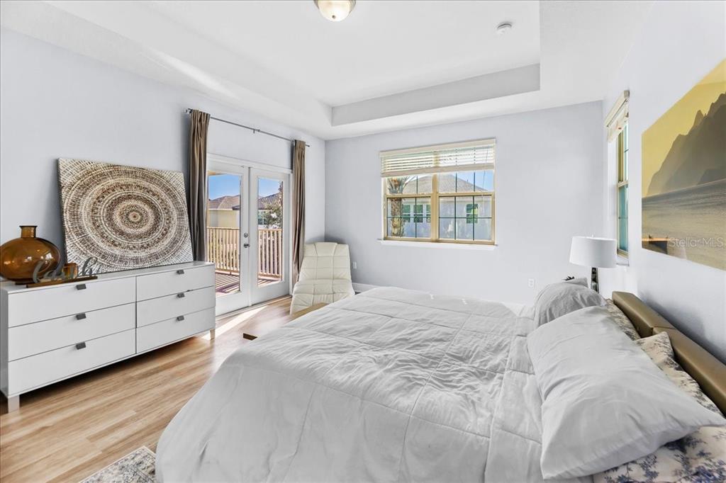 8746 Crescendo Avenue Windermere, FL 34786 - Photo 31 of 56 a bedroom with a bed and a dresser