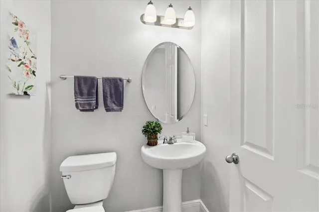 a view of a kitchen from the hallway