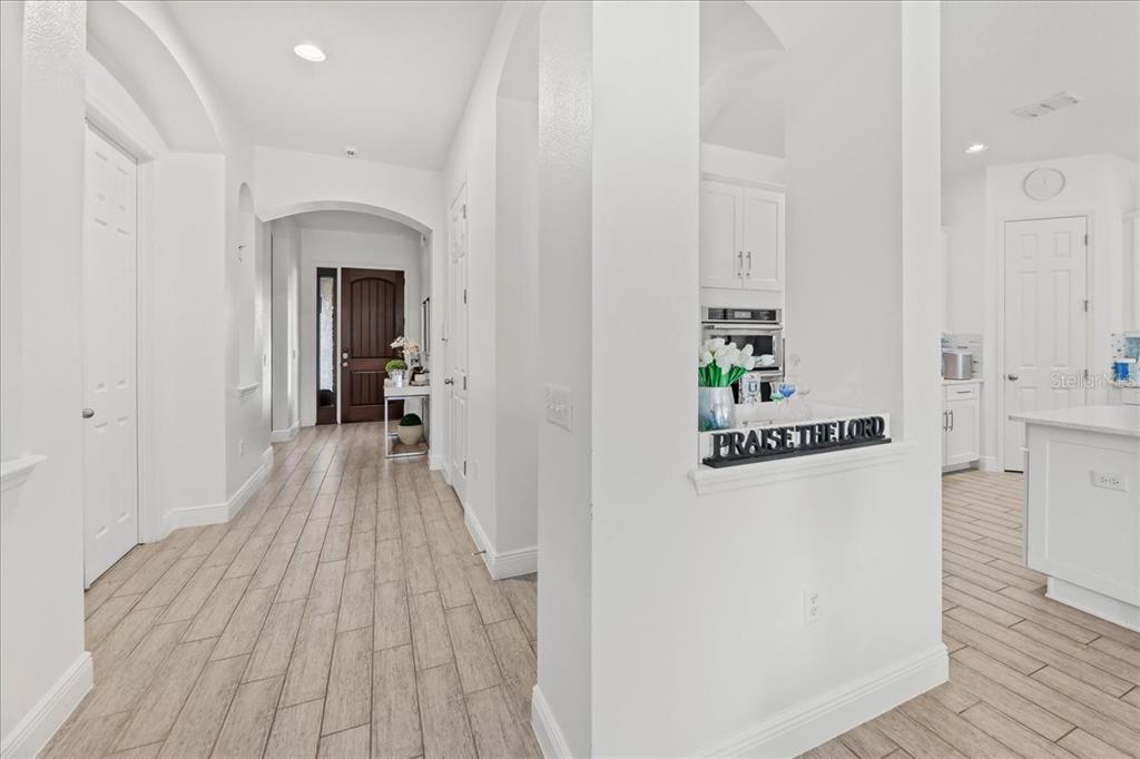 8746 Crescendo Avenue Windermere, FL 34786 - Photo 37 of 56 a view of a kitchen from the hallway