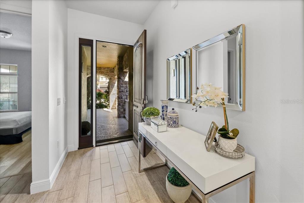 8746 Crescendo Avenue Windermere, FL 34786 - Photo 38 of 56 a bathroom with a sink and a mirror