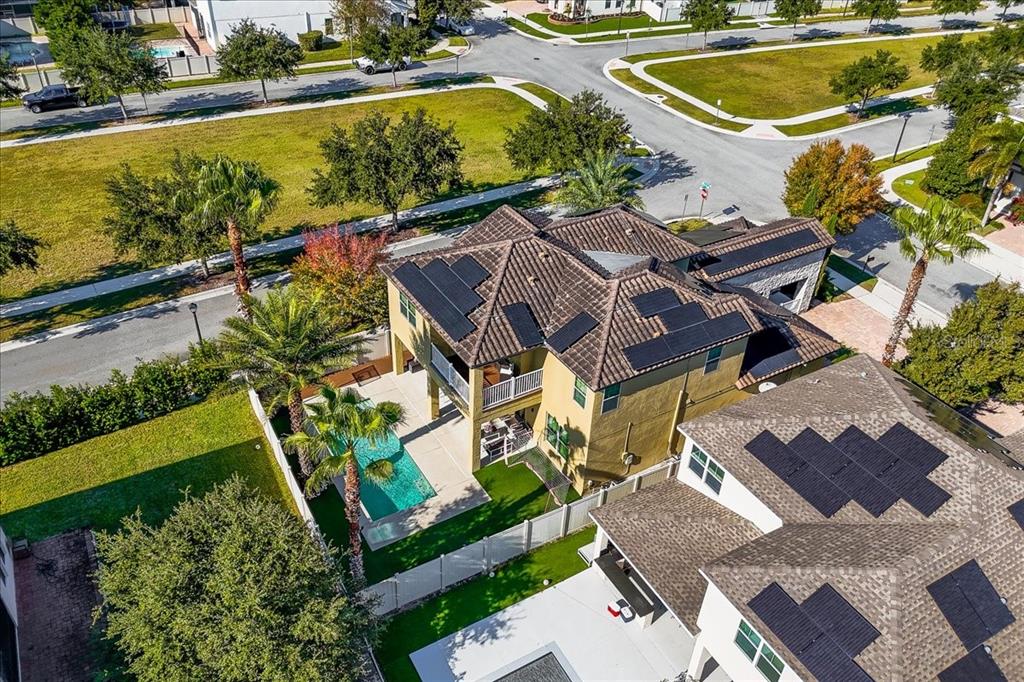 8746 Crescendo Avenue Windermere, FL 34786 - Photo 46 of 56 an aerial view of a house with a swimming pool