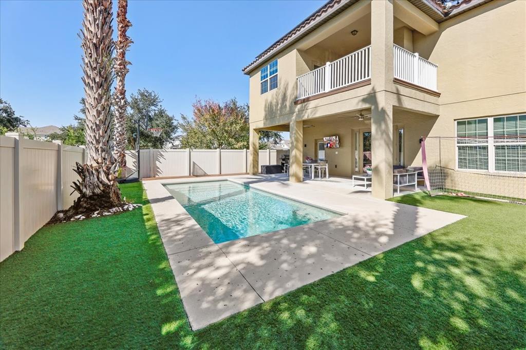 8746 Crescendo Avenue Windermere, FL 34786 - Photo 47 of 56 a view of a patio with a yard