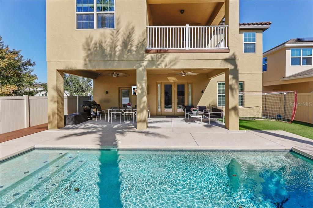8746 Crescendo Avenue Windermere, FL 34786 - Photo 48 of 56 front view of a house with a yard