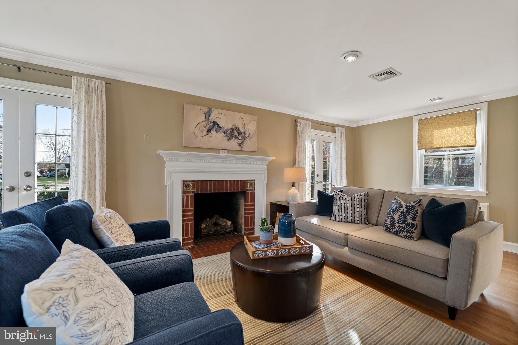 302 Shelbourne Road Havertown, PA 19083 - Photo 15 of 45 a living room with furniture and a fireplace