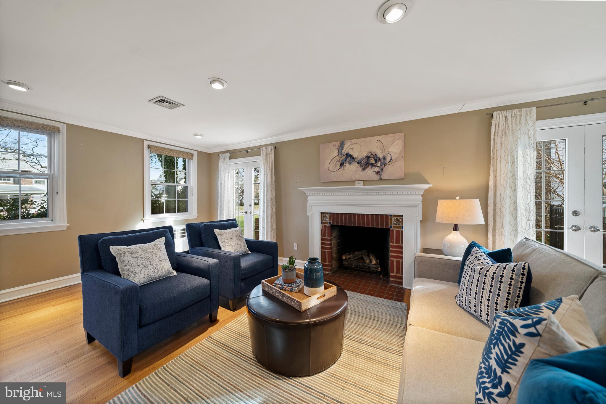 302 Shelbourne Road Havertown, PA 19083 - Photo 16 of 45 a living room with furniture and a fireplace