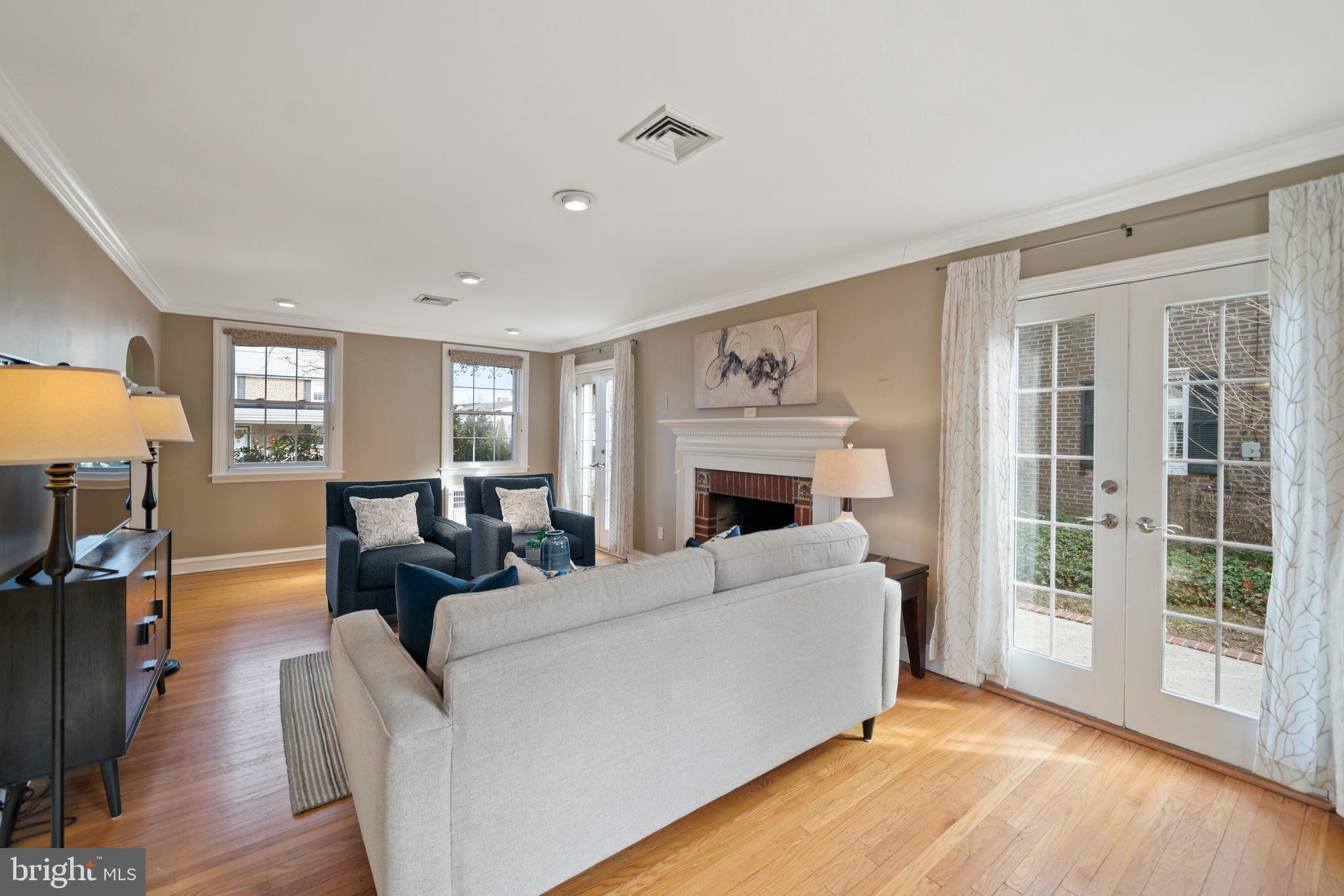 302 Shelbourne Road Havertown, PA 19083 - Photo 19 of 45 a living room with furniture and a fireplace