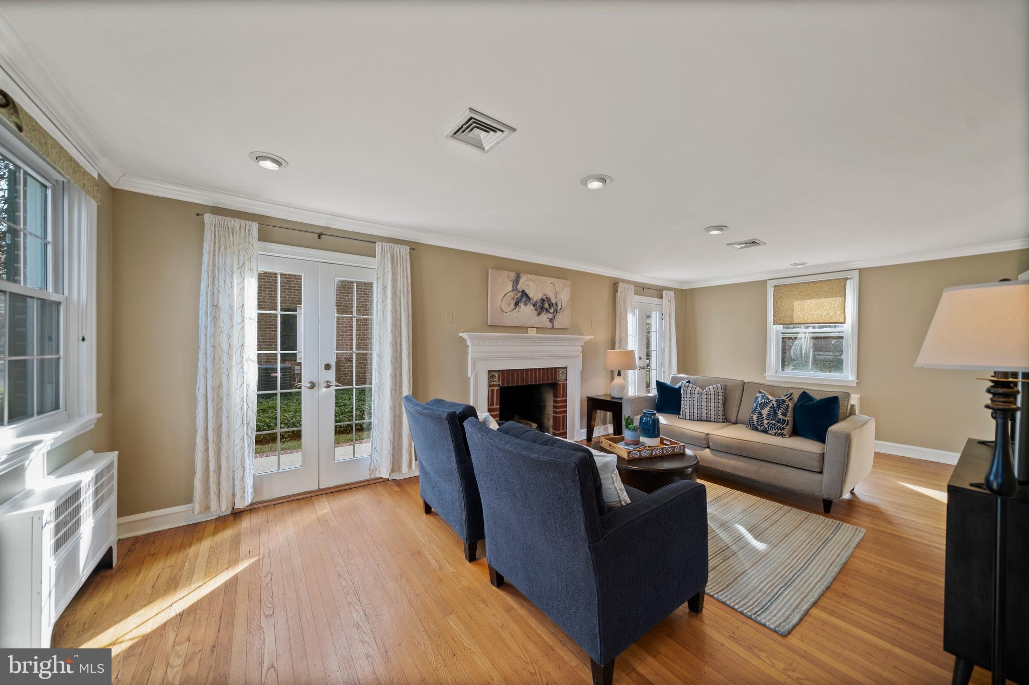 302 Shelbourne Road Havertown, PA 19083 - Photo 20 of 45 a living room with furniture and a fireplace