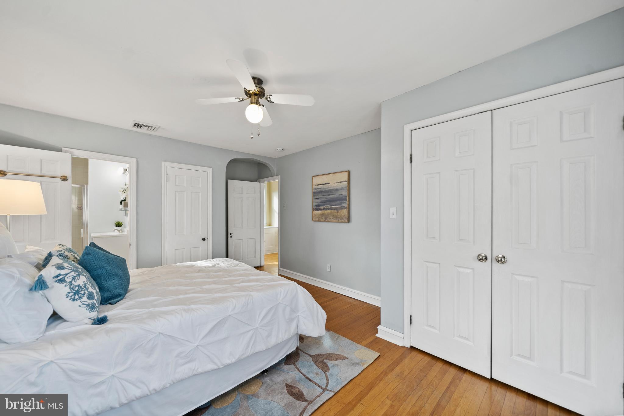 302 Shelbourne Road Havertown, PA 19083 - Photo 24 of 45 a bedroom with a large bed and wooden floor