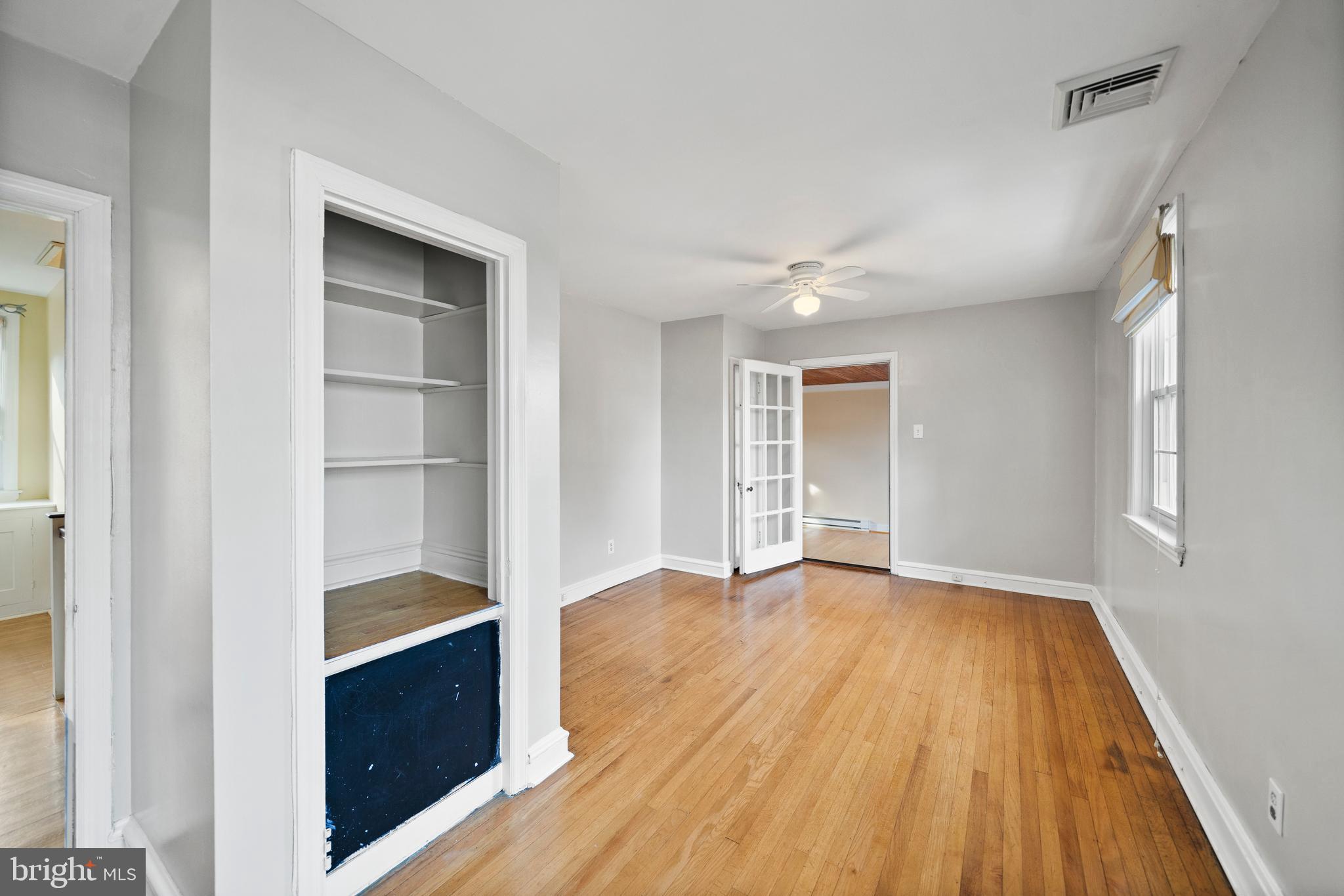 302 Shelbourne Road Havertown, PA 19083 - Photo 31 of 45 a view of an empty room with wooden floor and closet