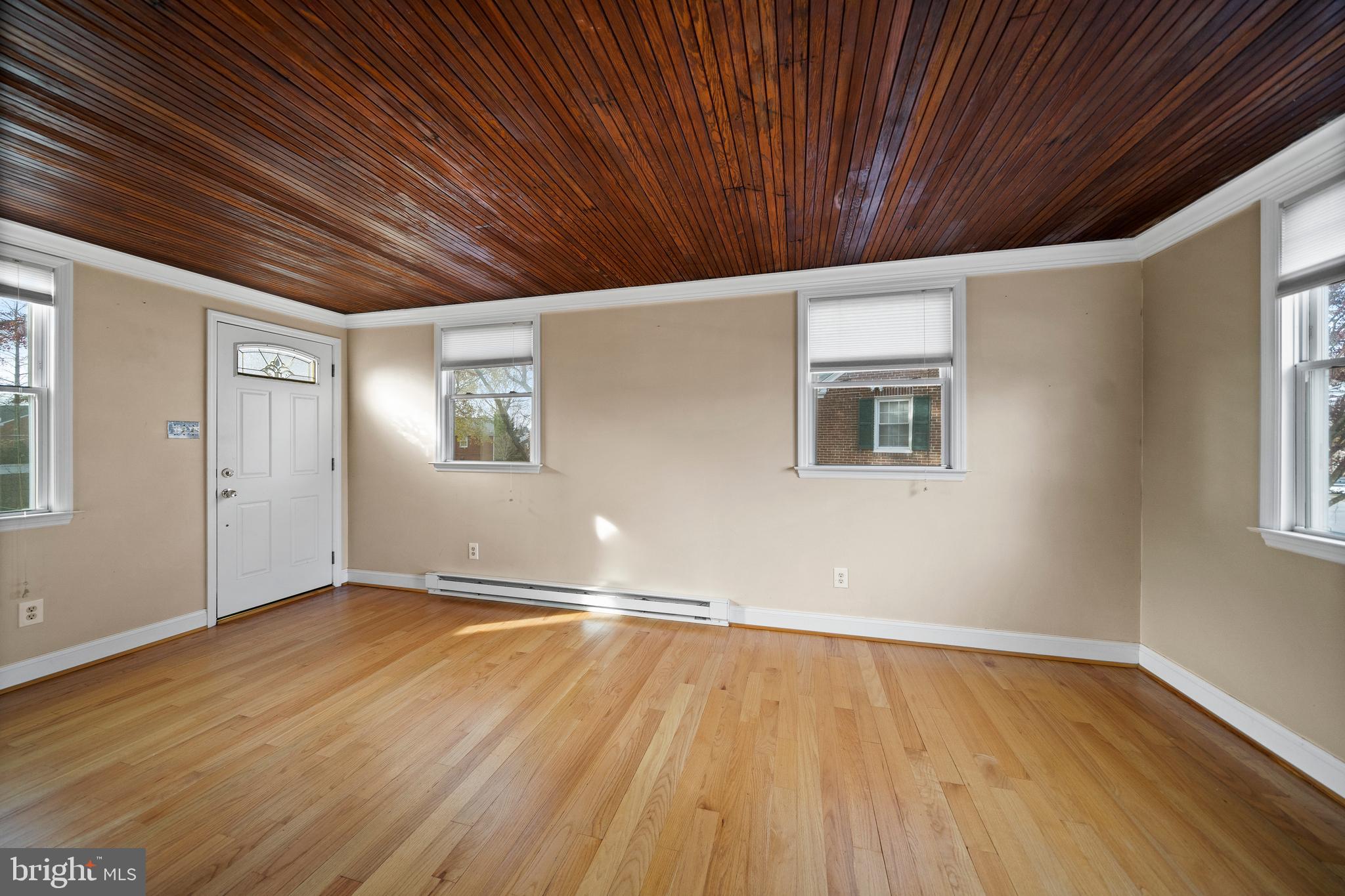 302 Shelbourne Road Havertown, PA 19083 - Photo 35 of 45 a view of empty room with wooden floor