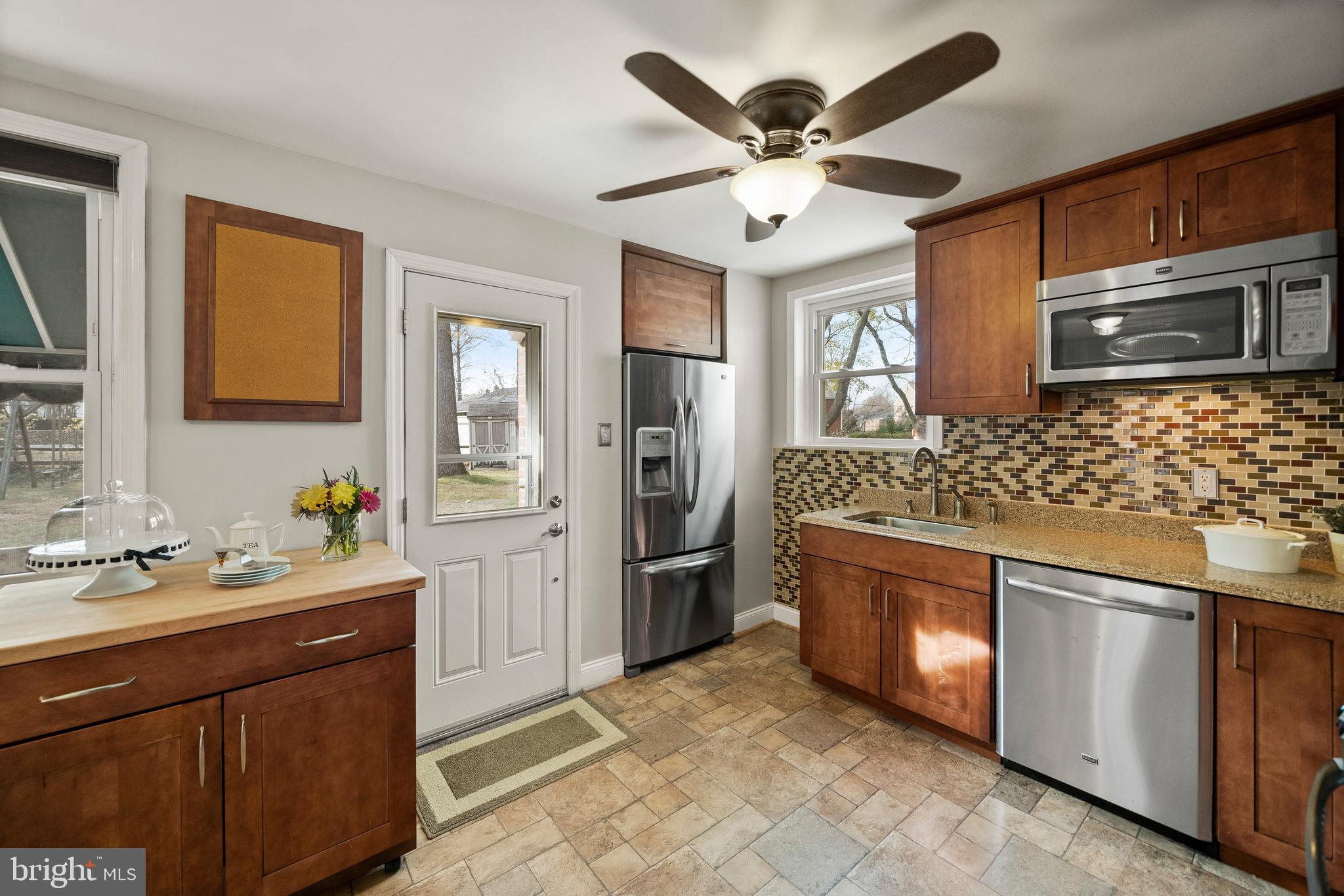 302 Shelbourne Road Havertown, PA 19083 - Photo 9 of 45 a kitchen with stainless steel appliances granite countertop a sink and stove