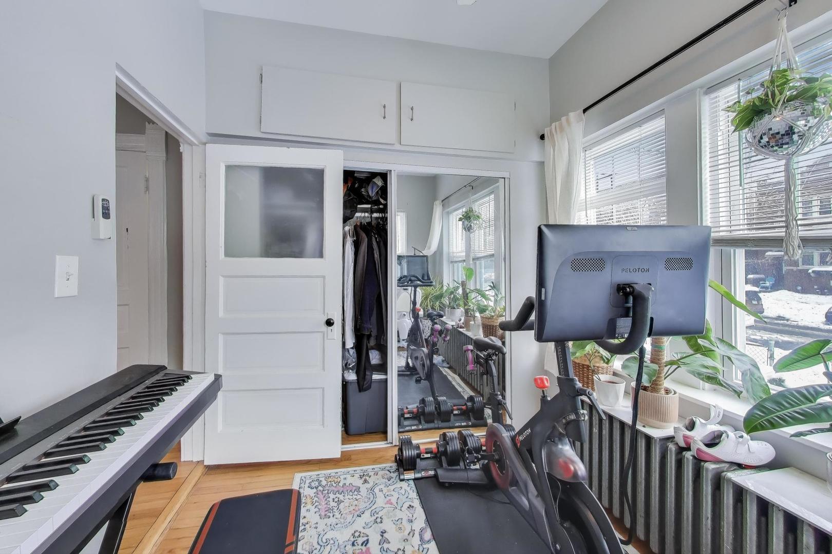 7330 North Honore Street Chicago, IL 60626 - Photo 12 of 43 a view of a room with gym equipment