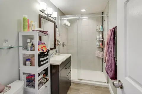 a view of a hallway with washer and dryer