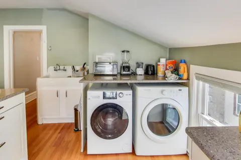 a view of livingroom with washer and dryer