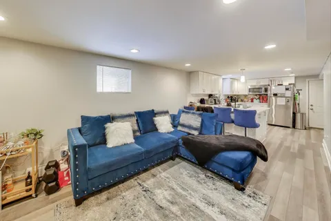 a living room with furniture and a couch
