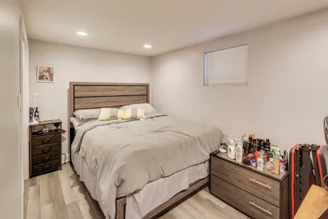 a bedroom with a bed and closet