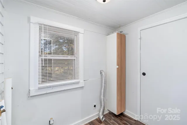 a view of a room that has a window in it