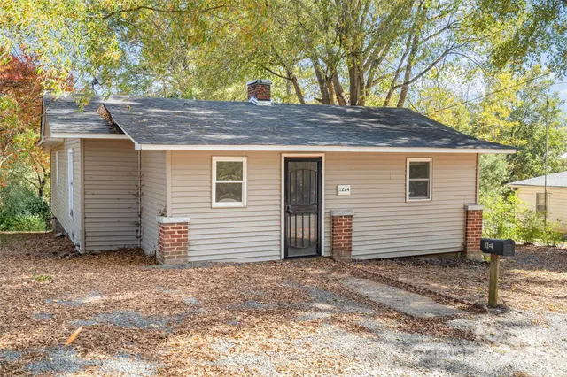 a house view with a backyard