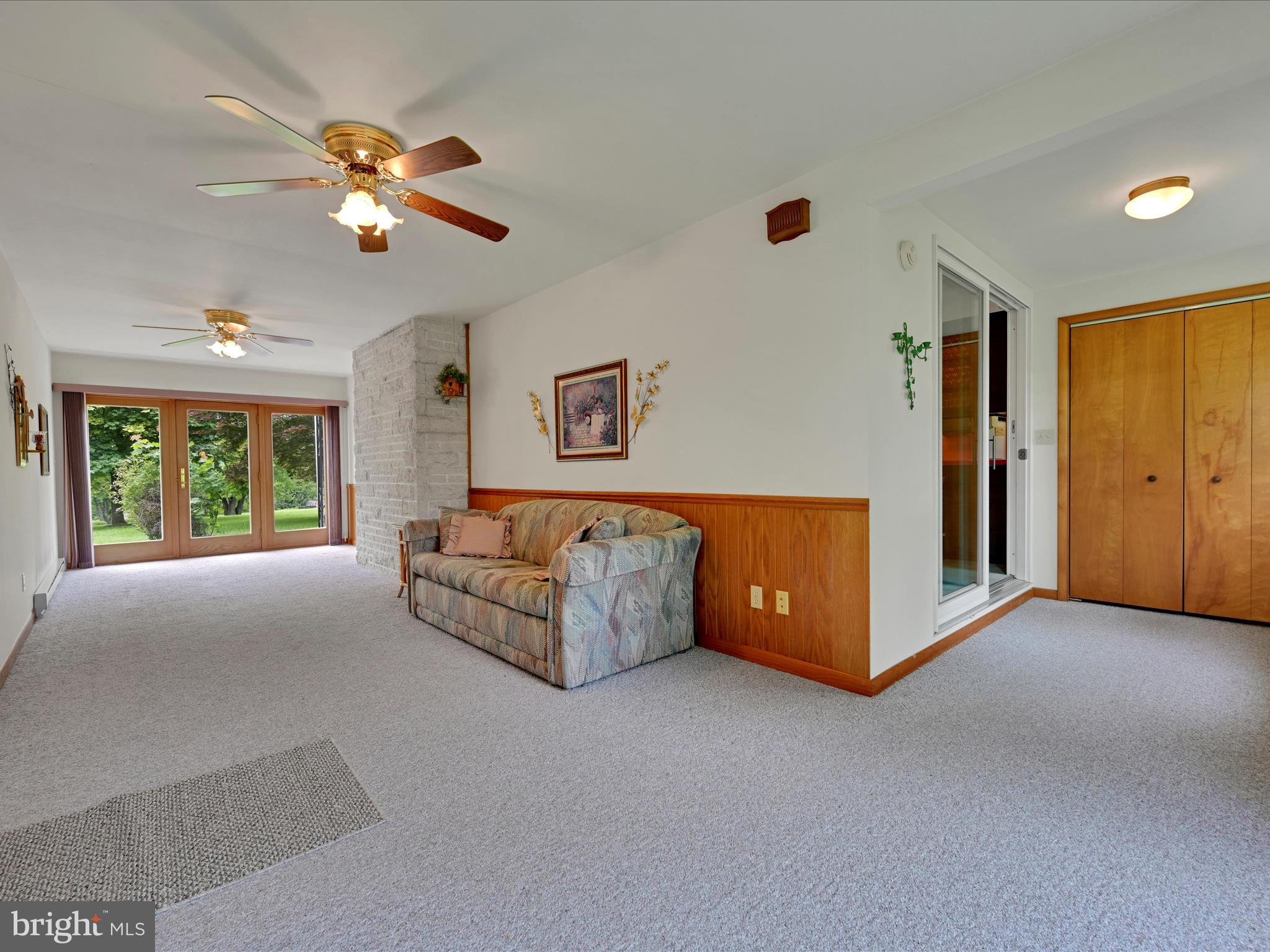 858 Hill Road Ashland, PA 17921 - Photo 13 of 41 a living room with furniture and a chandelier
