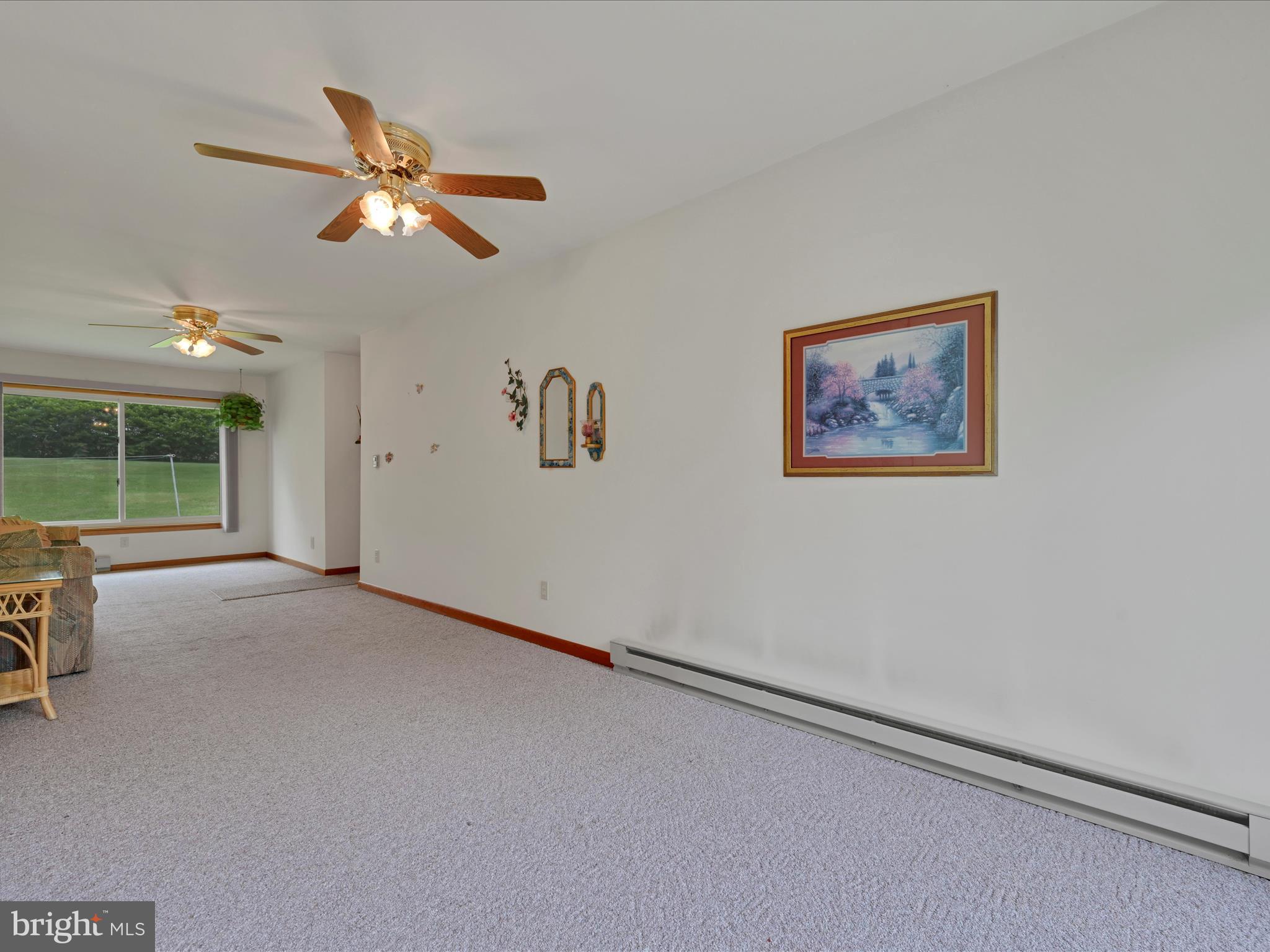 858 Hill Road Ashland, PA 17921 - Photo 14 of 41 a view of a livingroom with a fan