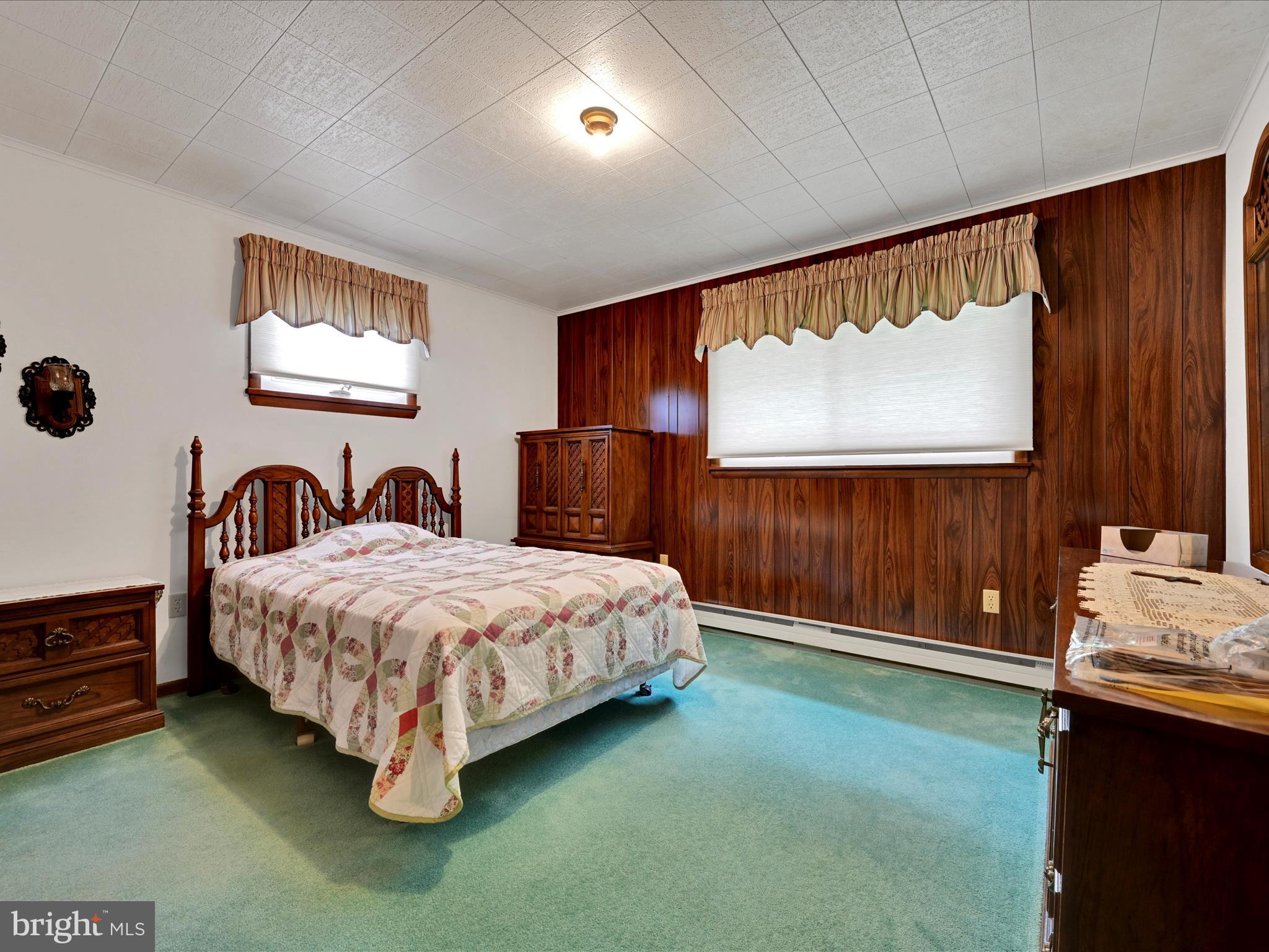 858 Hill Road Ashland, PA 17921 - Photo 19 of 41 a bedroom with a bed and a window