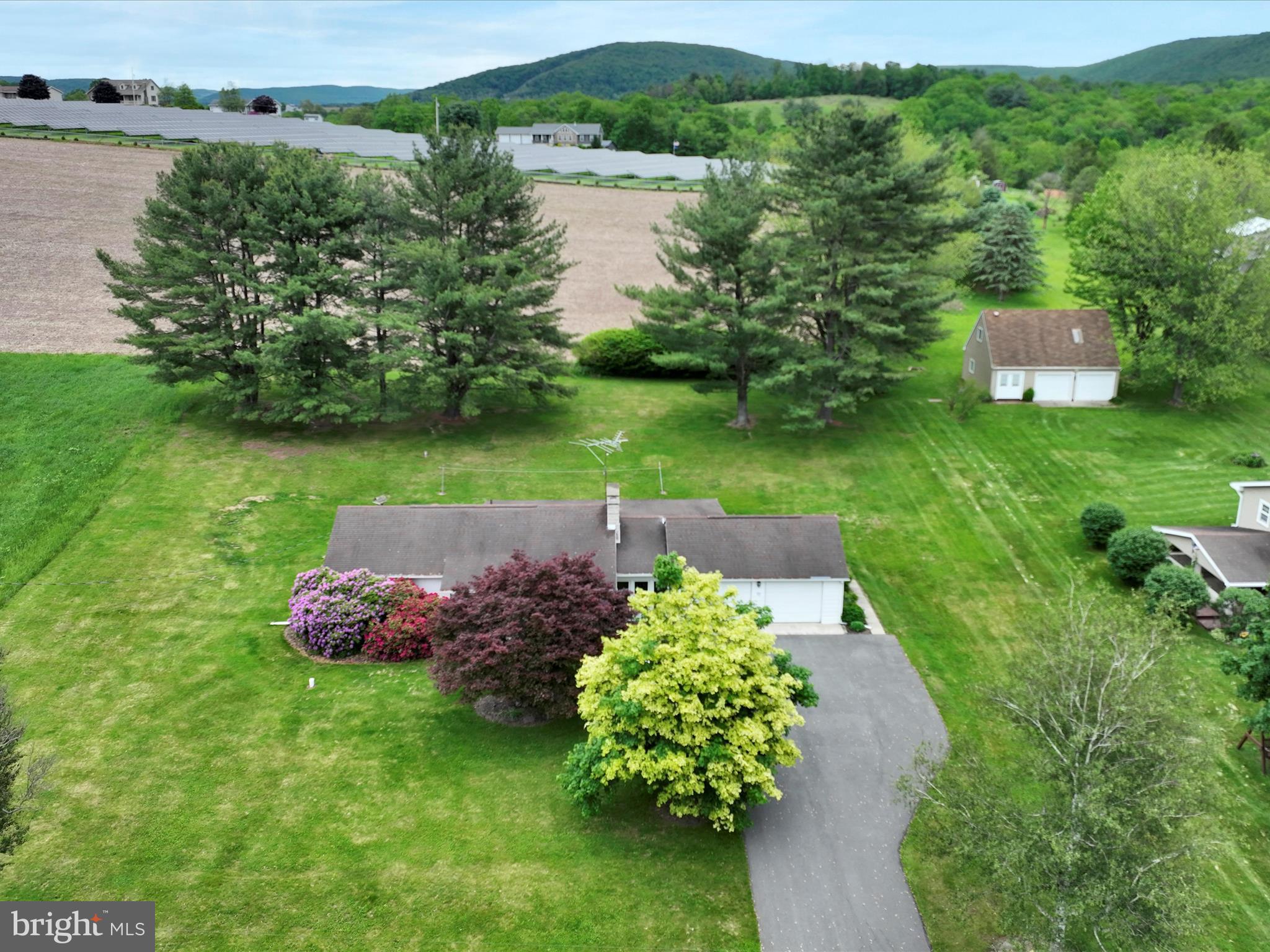 858 Hill Road Ashland, PA 17921 - Photo 34 of 41 an aerial view of a house with a yard and lake view