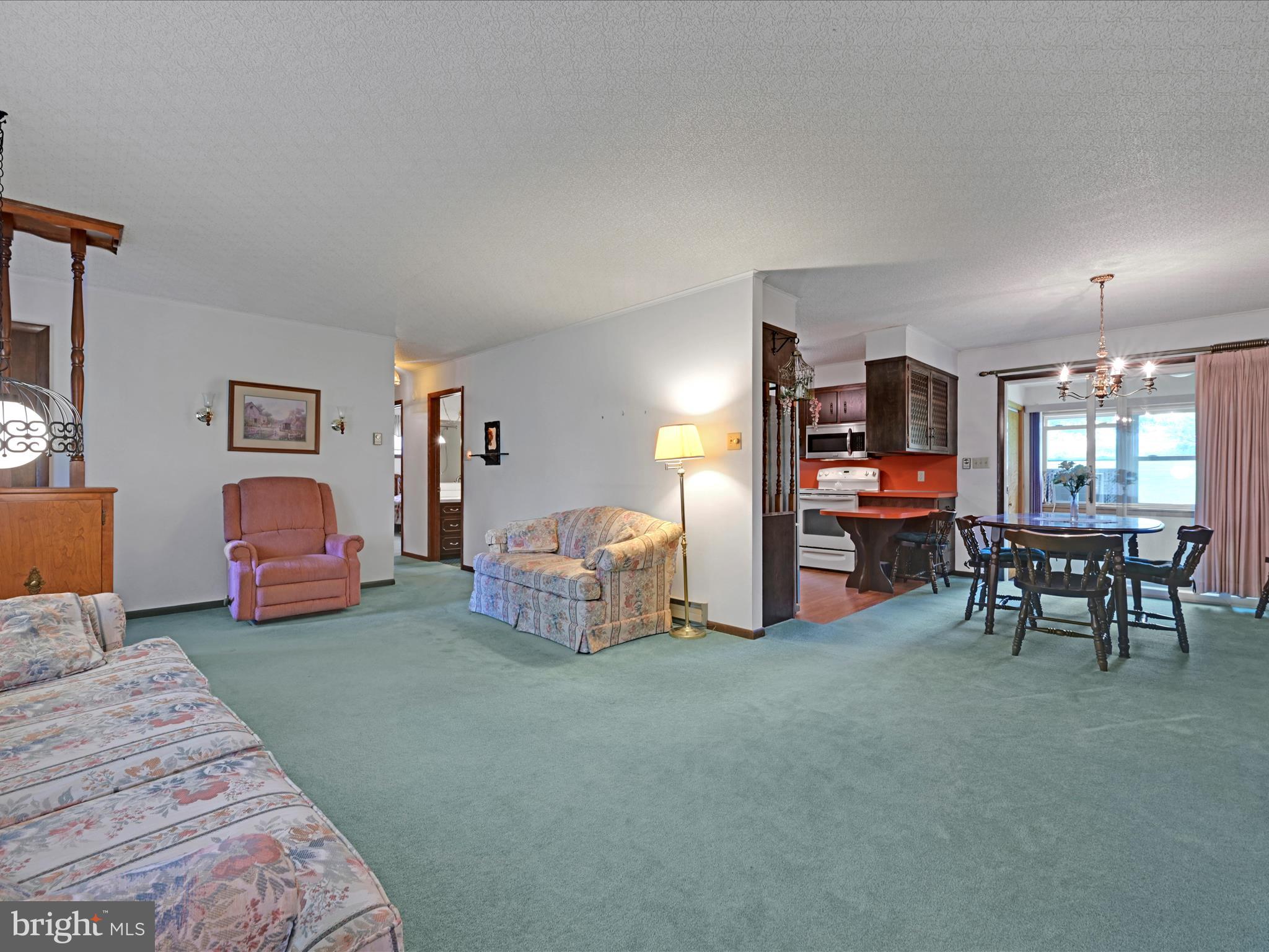 858 Hill Road Ashland, PA 17921 - Photo 6 of 41 a bedroom with furniture and a chair