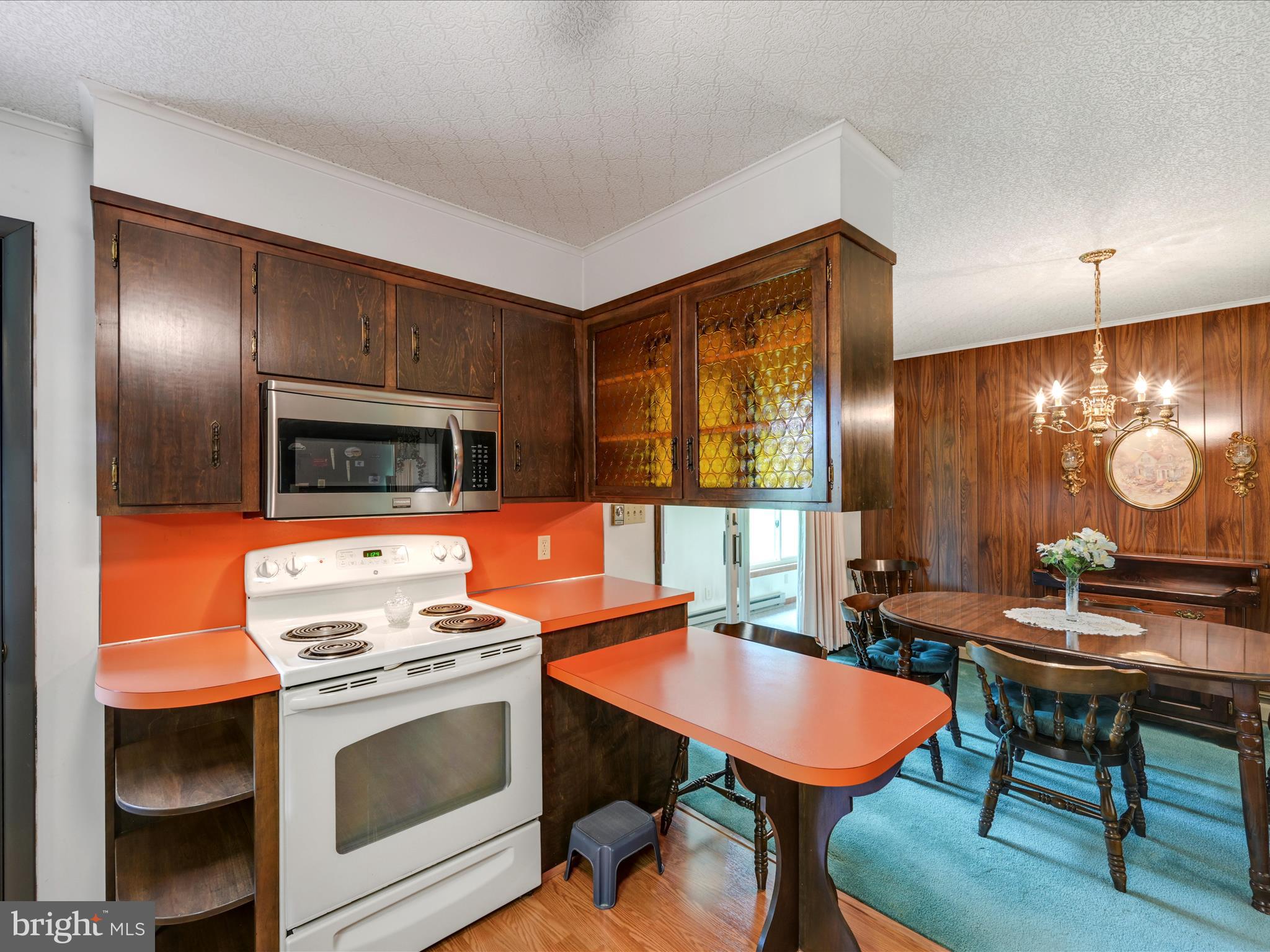 858 Hill Road Ashland, PA 17921 - Photo 10 of 41 a kitchen with stainless steel appliances granite countertop a stove a refrigerator a kitchen island a dining table and chairs