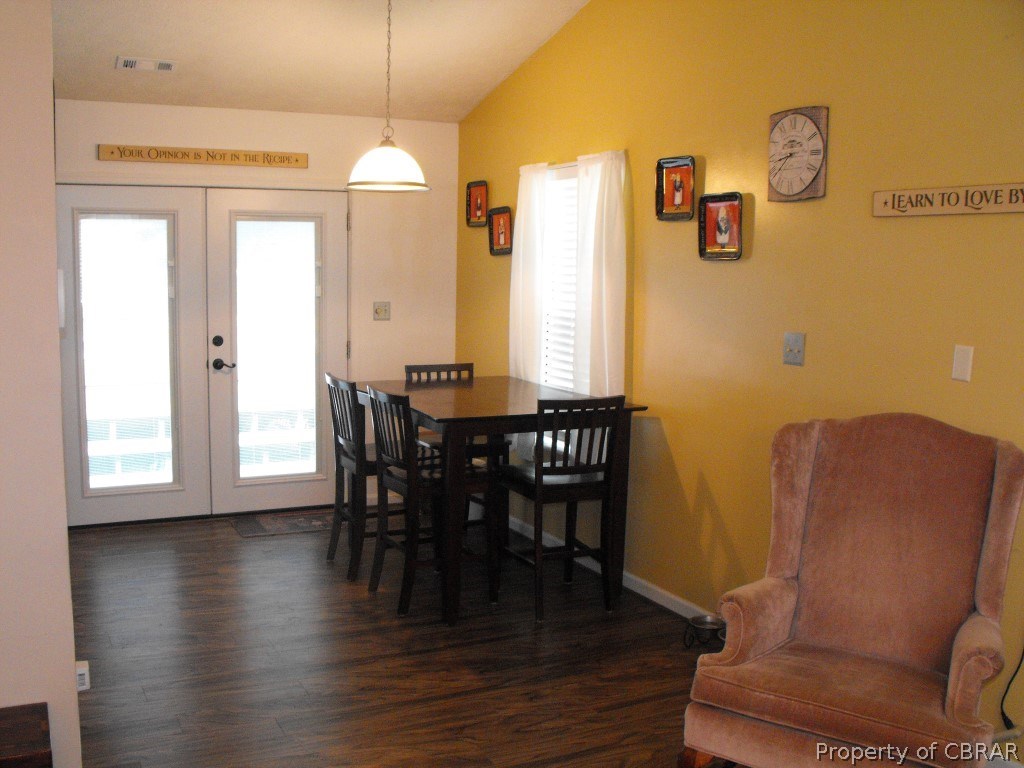 207 Windsor Road Dutton, VA 23050 - Photo 7 of 38 a dining room with furniture window wooden floor