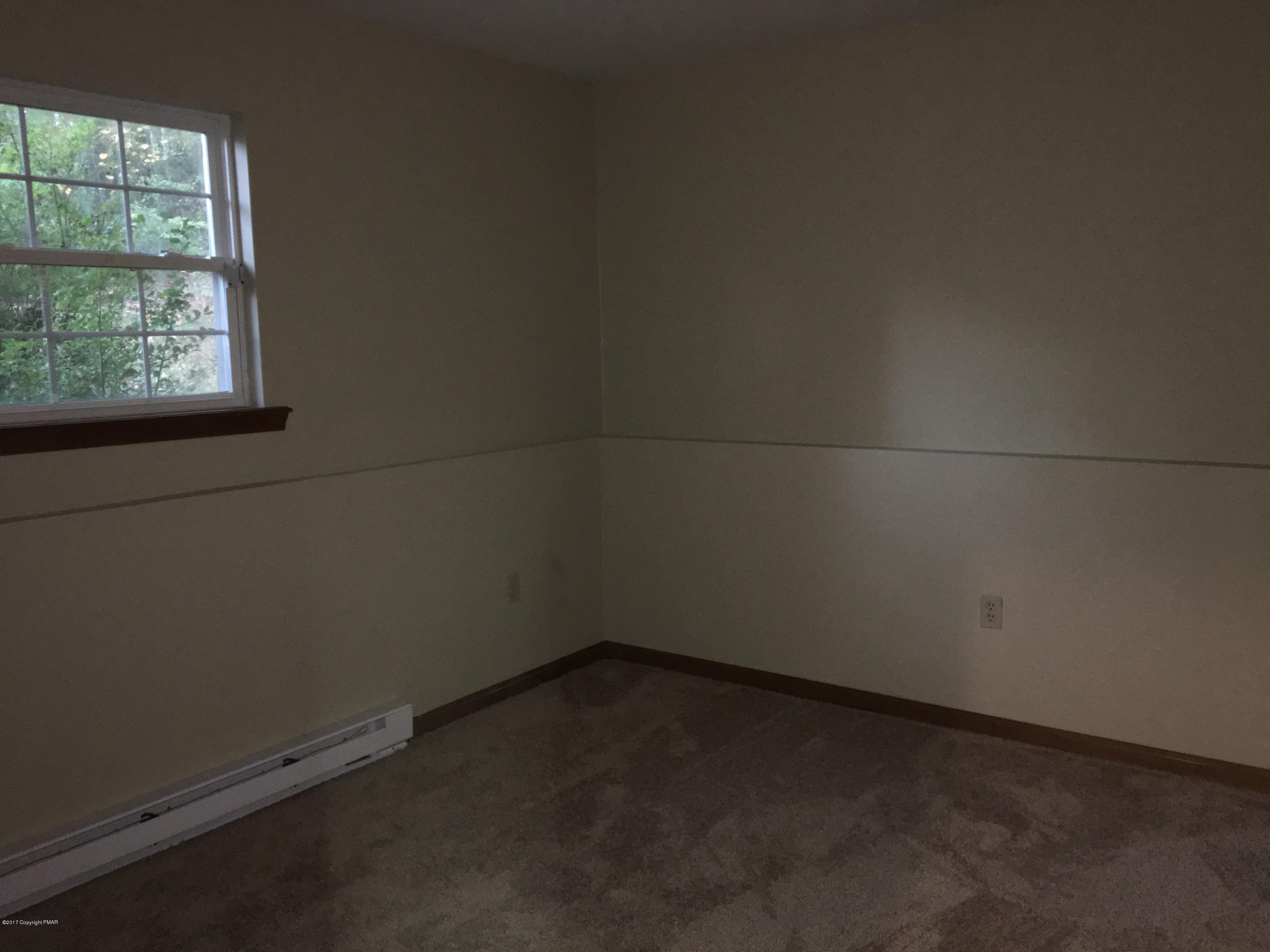 2185 Hill Road Effort, PA 18330 - Photo 11 of 17 an empty room with a window