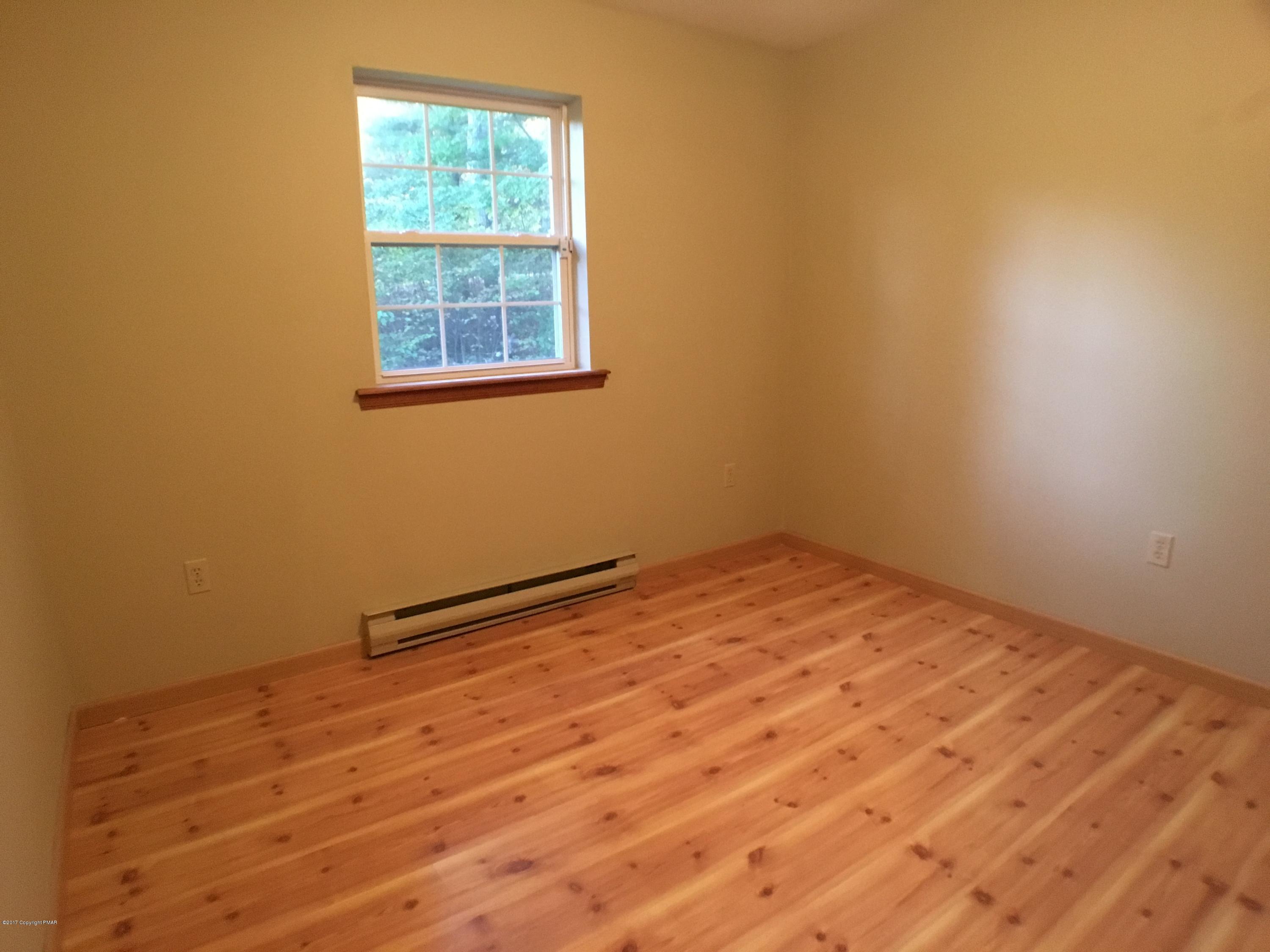 2185 Hill Road Effort, PA 18330 - Photo 6 of 17 a view of empty room with wooden floor