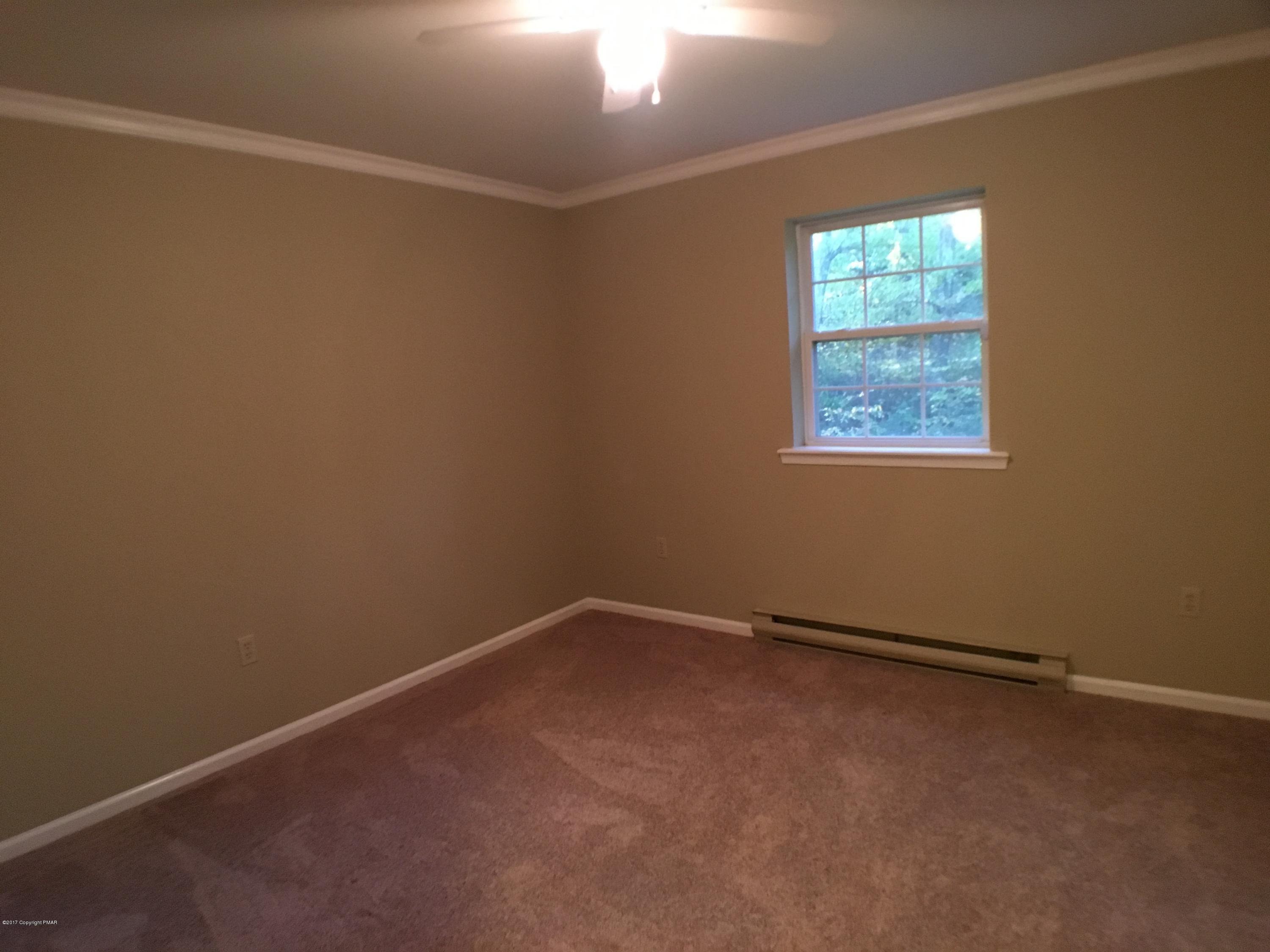 2185 Hill Road Effort, PA 18330 - Photo 7 of 17 an empty room with windows