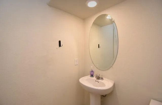 a kitchen with a stove and a microwave