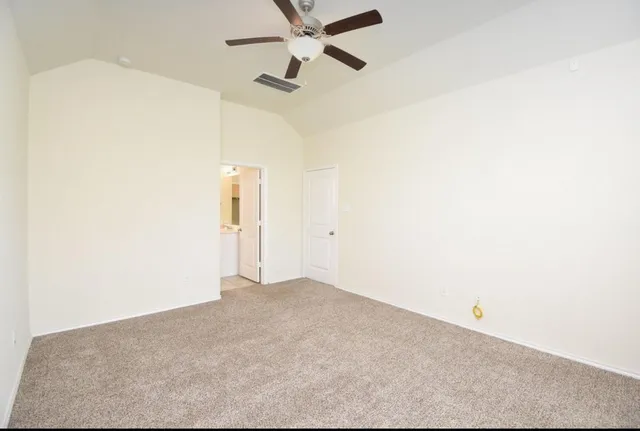 a bathroom with a bathtub and a sink
