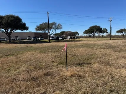 a view of a street in front of a house